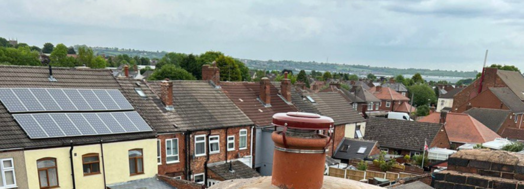 This is a photo taken from a roof which is being repaired by Gamston Roofing Repairs, it shows a street of houses, and their roofs